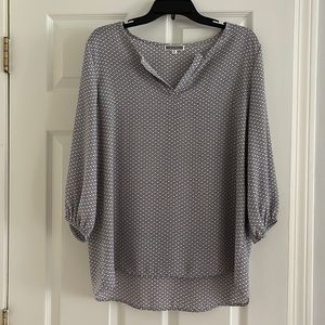 Beautiful black and white women’s blouse size medium.